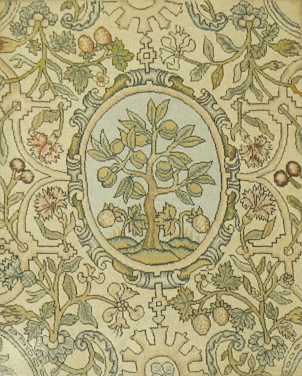 A 20th century framed fine petit point panel, worked with a framed central cartouche of a fruit tree, surrounded by an ornate vining fruit border. 25cm wide x 31cm high. Condition - all the colours and threads are strong
